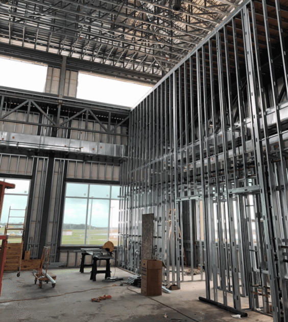 High ceiling room with steel stud framing